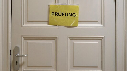 Door with a "examination" sign